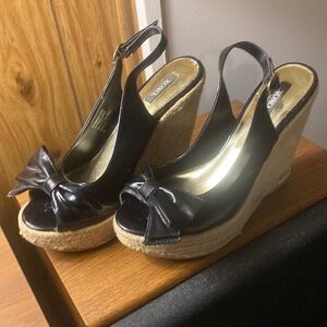 This is a black wedge heel size 8 bought originally from Belks.